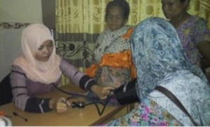 Aminah Bidan Yang Selalu Sempatkan Waktu Melayani Masyarakat