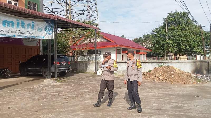 Personel Polsek Pulo Raja ajak masyarakat dukung sukseskan FI Powerboat. (Istimewa).