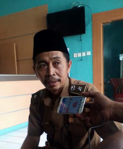 Halimi Kepala Desa Sarakan saat di wawancara detakbanten.com.