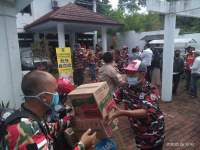 Laskar Merah Putih Cilegon Terjunkan Alat Berat dan Bagikan Sembako Untuk Warga Terdampak Banjir