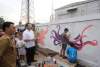 Ngabuburit Dimanfaatkan Bikin Mural