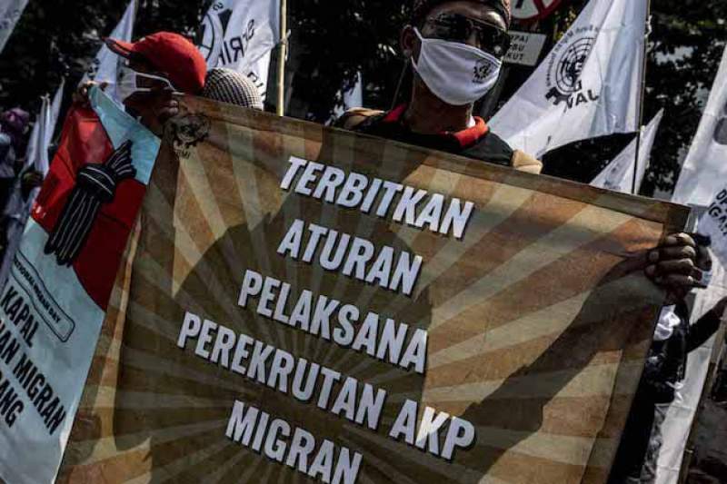 Ilustrasi aksi buruh menentang perlindungan pekerja migran.