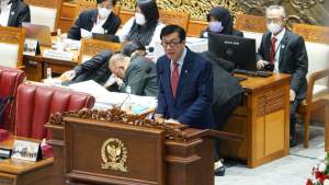 Menteri Hukum dan HAM Yasonna H. Laoly membacakan pendapat akhir Presiden atas RUU KUHP dalam Rapat Paripurna di Gedung DPR RI, Jakarta, Selasa (6/12/2022).