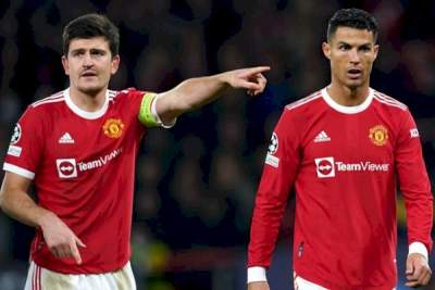 Cristiano Ronaldo dan Harry Maguire. (net)